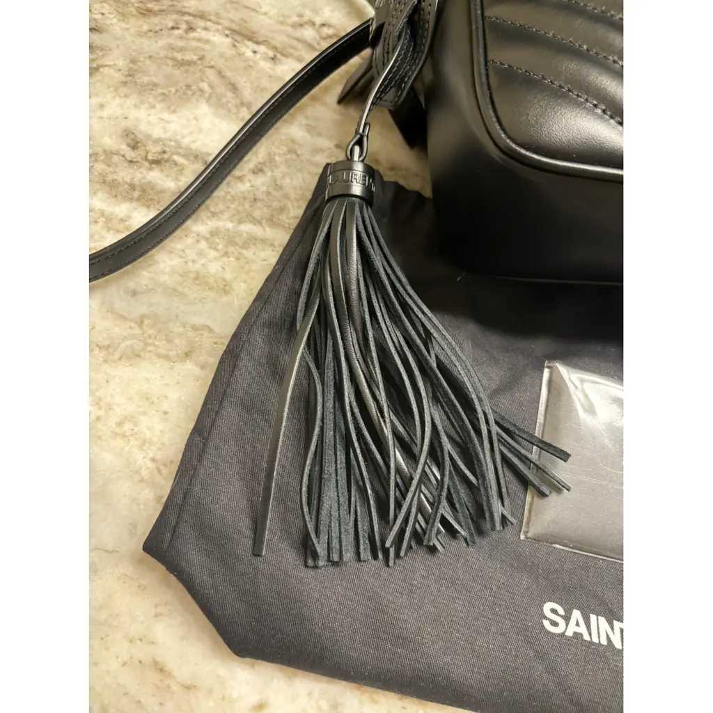 YSL Sac bandoulière Camera Lou, Très bon état
Noir