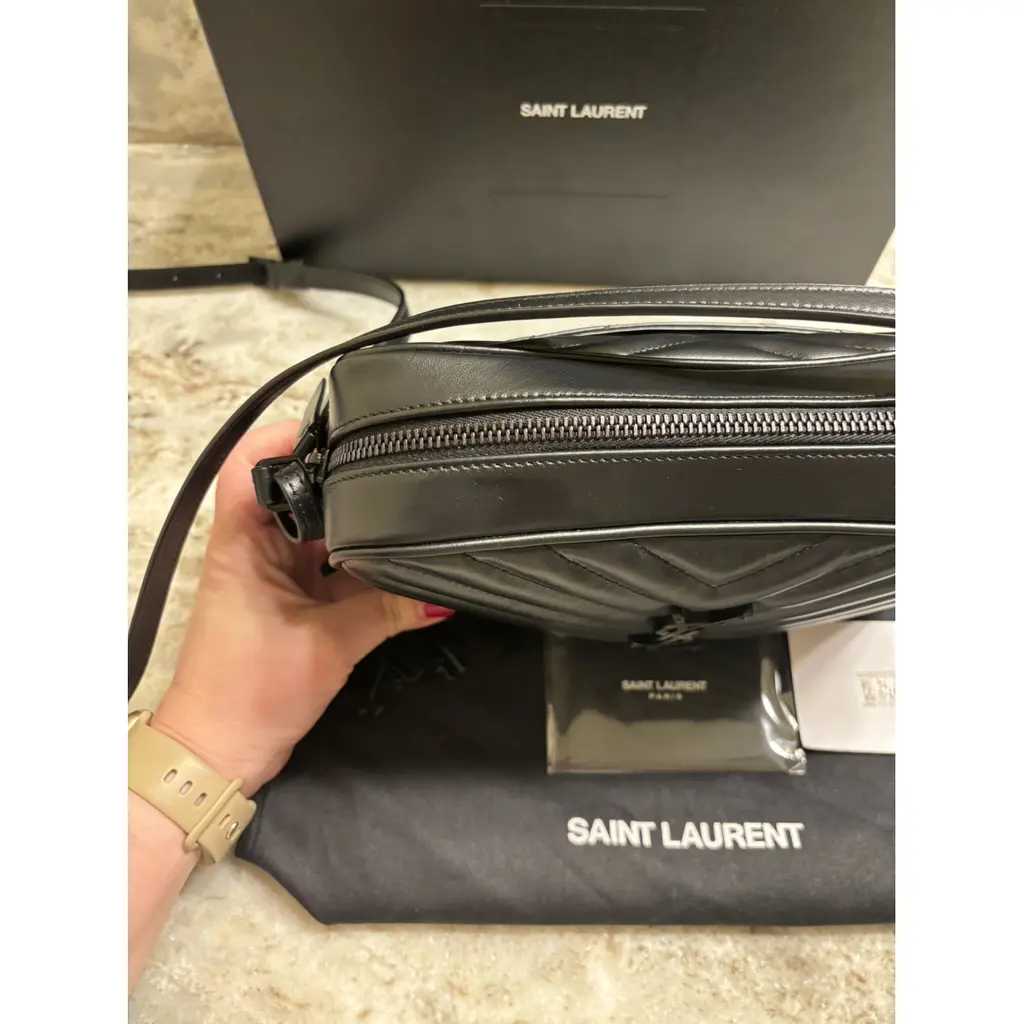 YSL Sac bandoulière Camera Lou, Très bon état
Noir