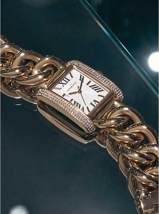 MK Montre Emery surdimensionnée dorée à maillons gourmette et à pavé