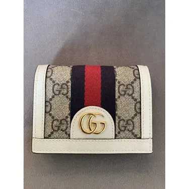 GG
Portefeuille en toile