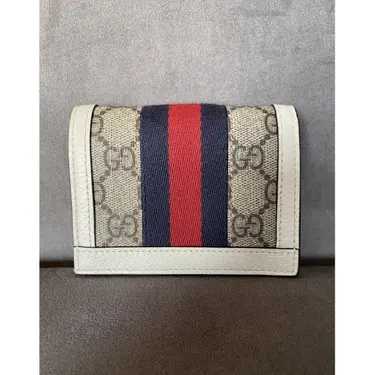 GG
Portefeuille en toile