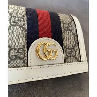 GG
Portefeuille en toile