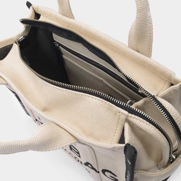M@rc Jacôbs
The Medium Tote Bag Jacquard