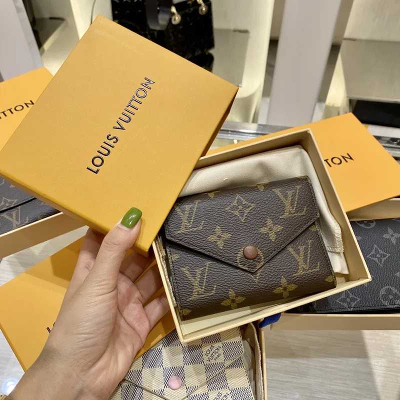 LV compact wallet