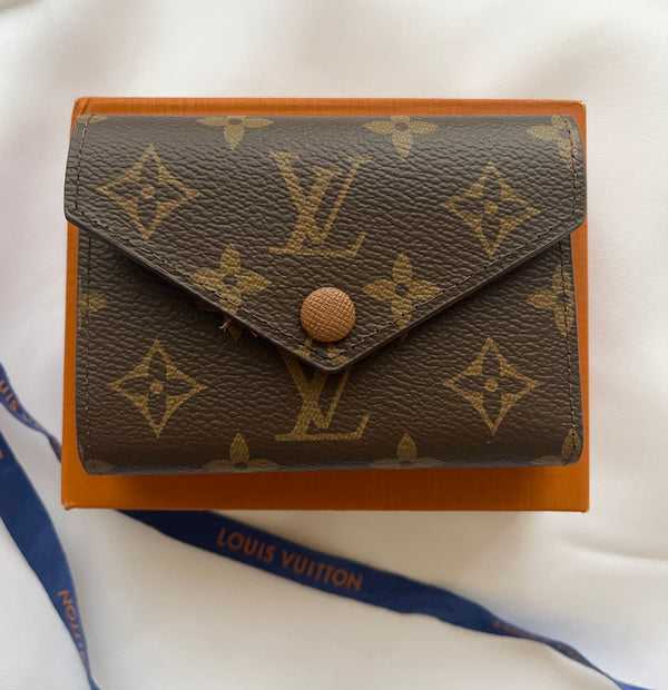 LV compact wallet