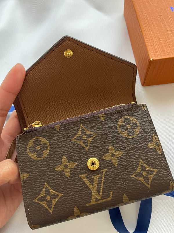 LV compact wallet