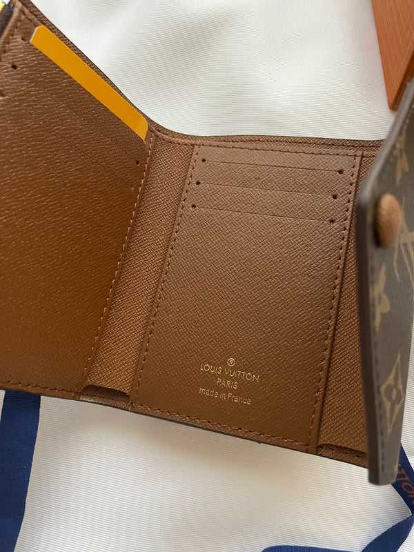LV compact wallet