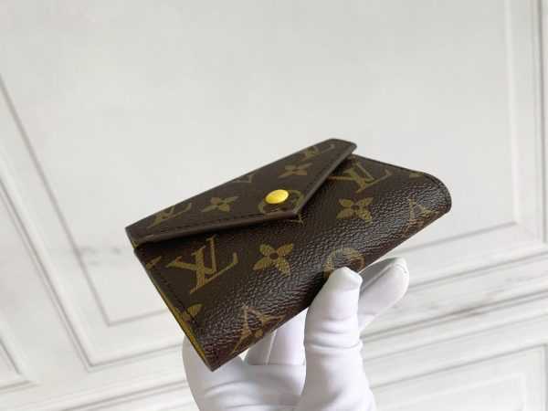 LV
Portefeuille Victorine
Marron