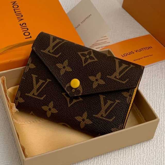 LV
Portefeuille Victorine
Marron