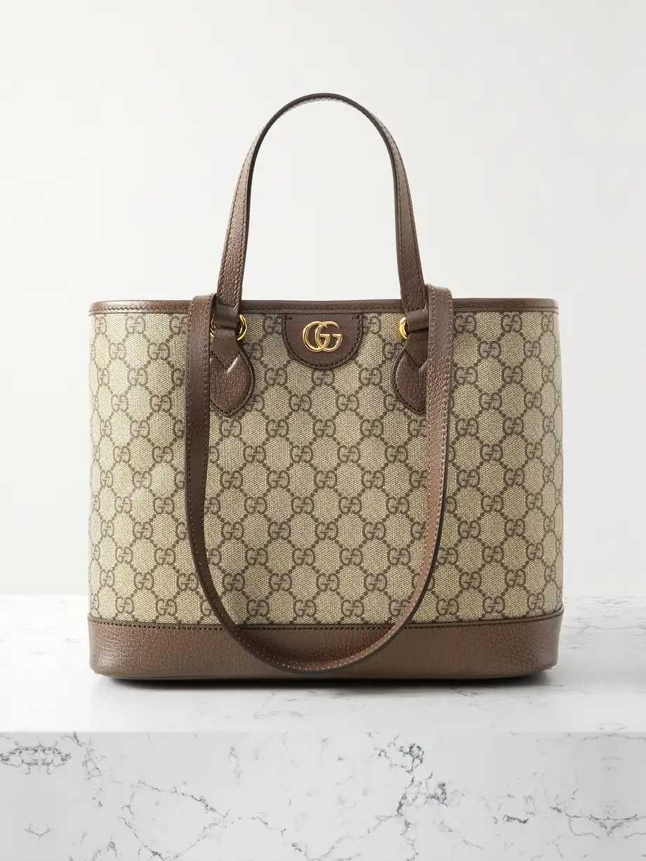 GG
Sac porté épaule en toile enduite imprimée