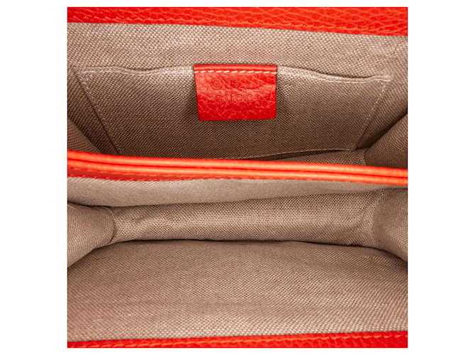 GG Sac à bandoulière orange à petit dollar entrelacé