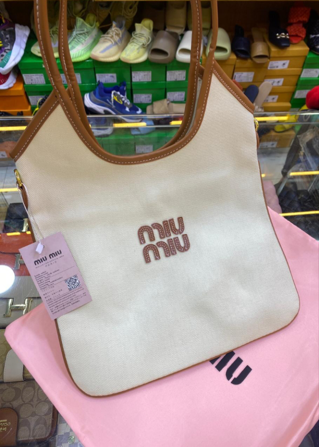 MIÛ MIÜ
Canvas Ivy Tote Bag