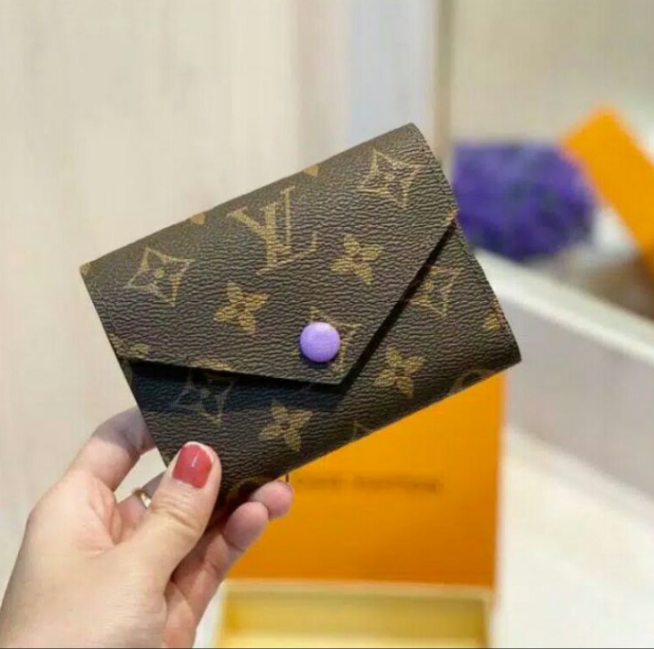 LV Portefeuille en toile Victorine
