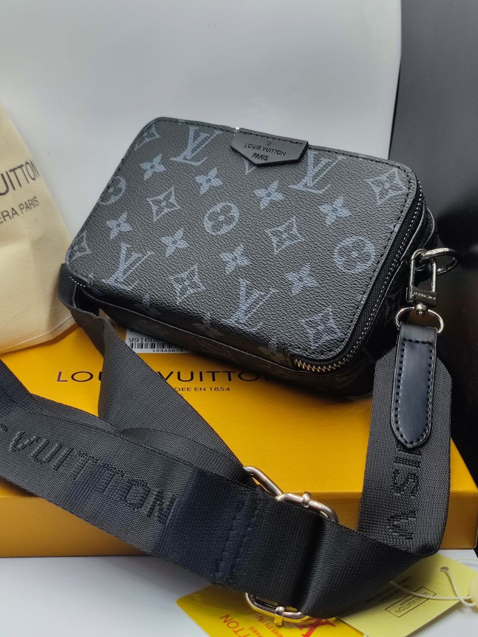 LV Portefeuille portable LV Alpha neuf Gris