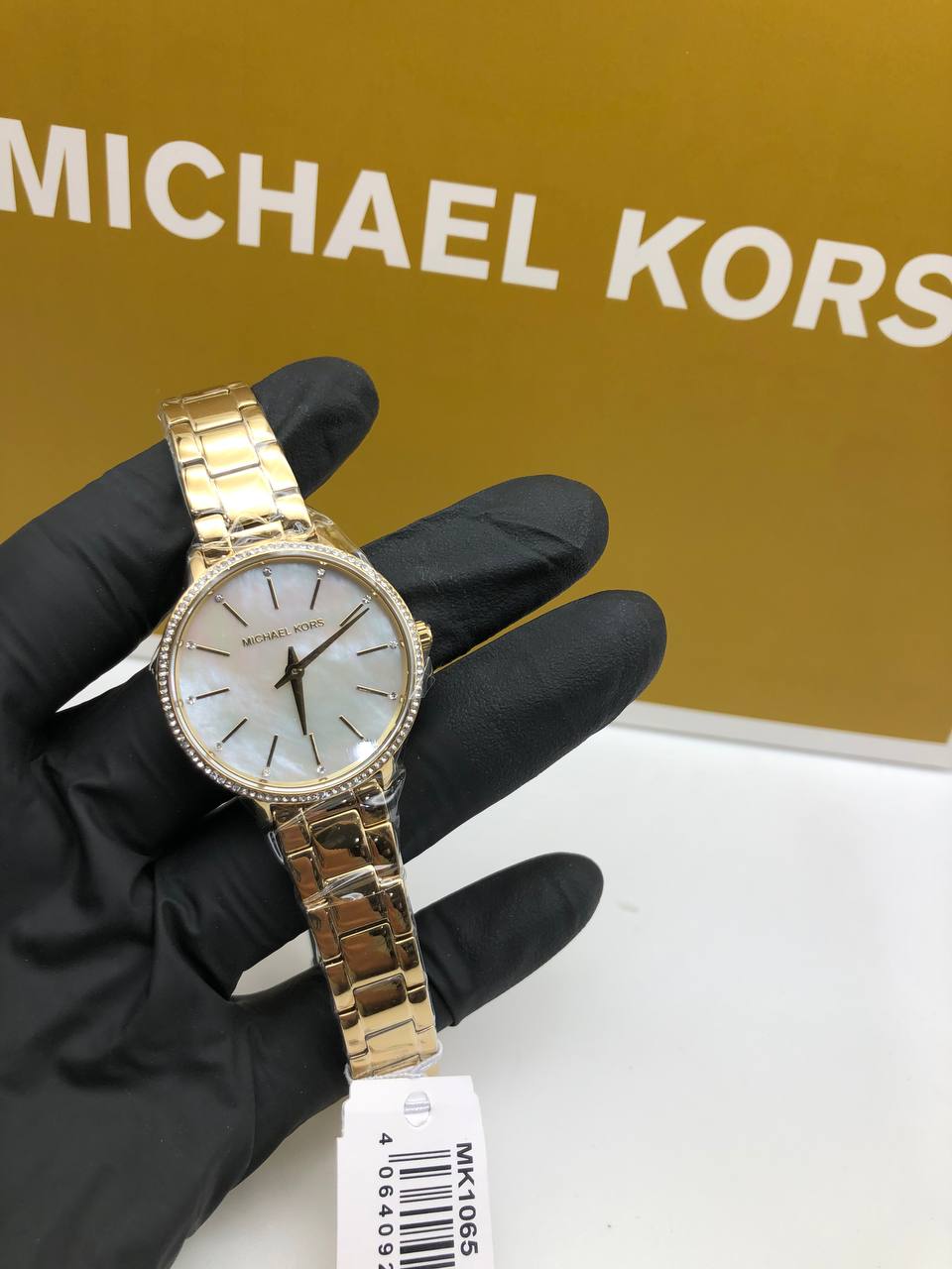Montre à quartz Mich@el Kors avec cadran blanc nacré