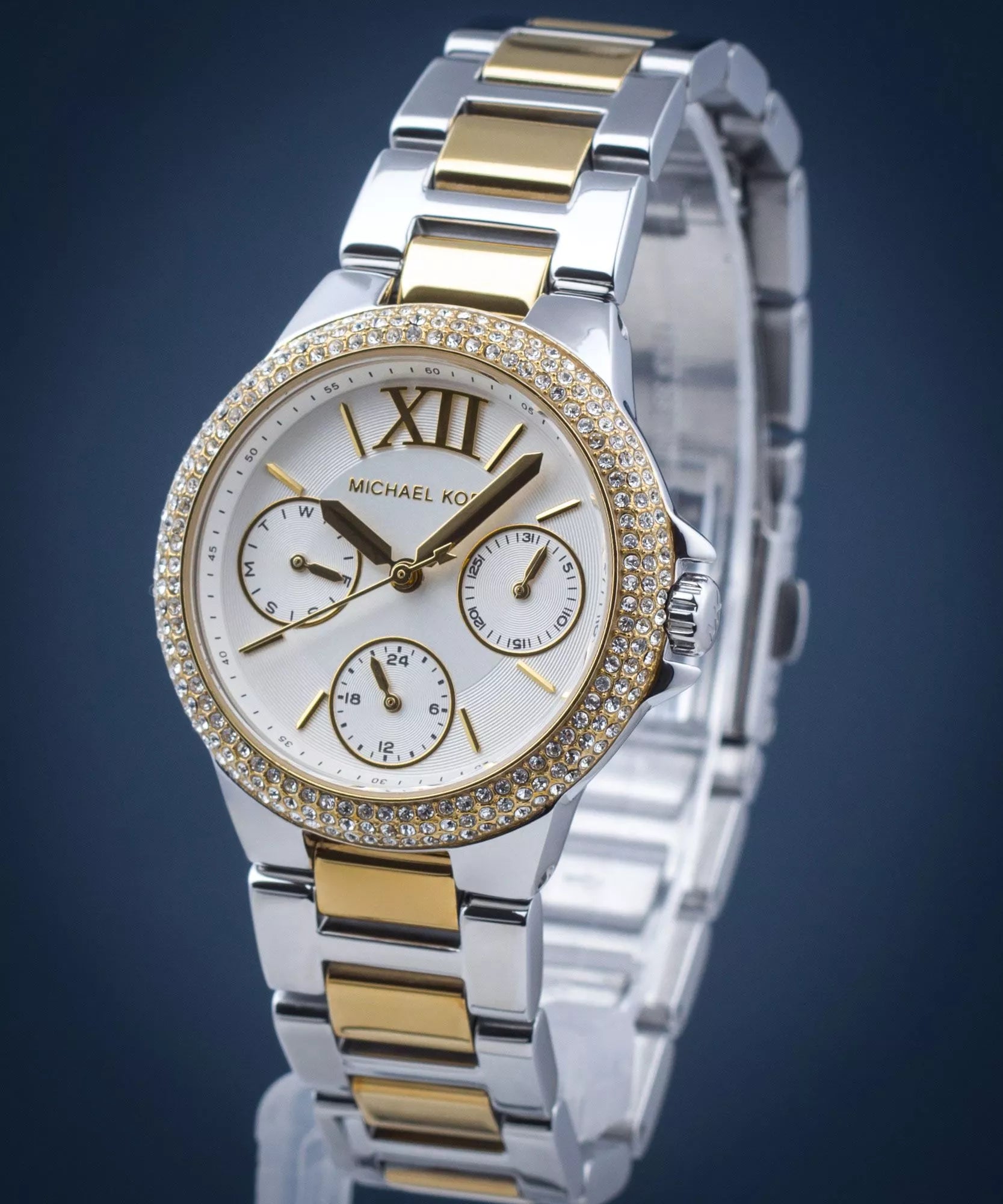 Mich@el Kors
Petite montre Camille bicolore avec pierres pavées