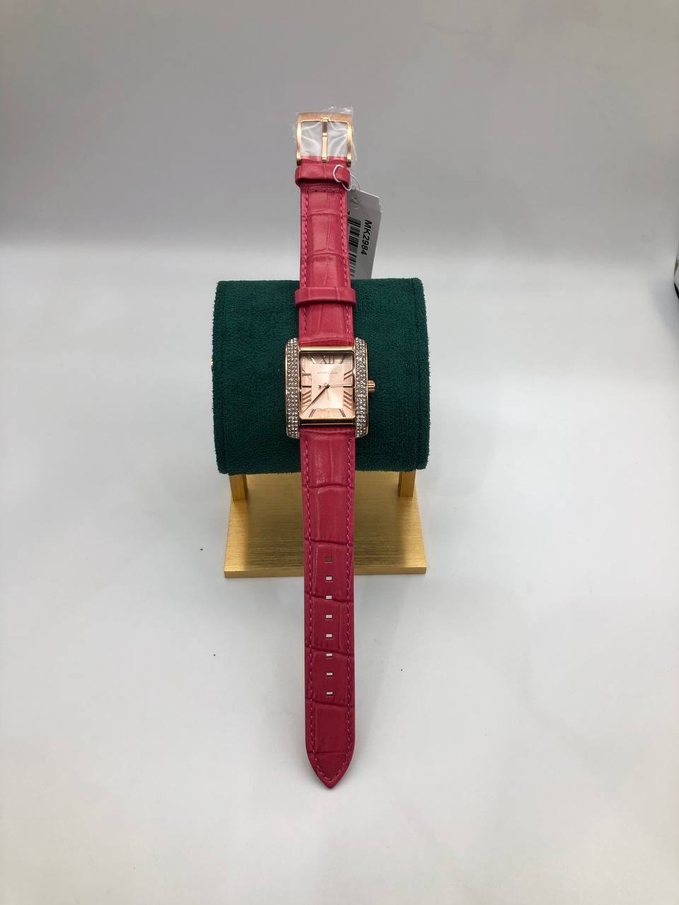 Mich@el Kors
Montre Emery de ton or rose à pavé et à bracelet en cuir gaufré à motif crocodile