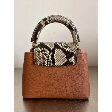 LV Sac à main Capucines
Marron