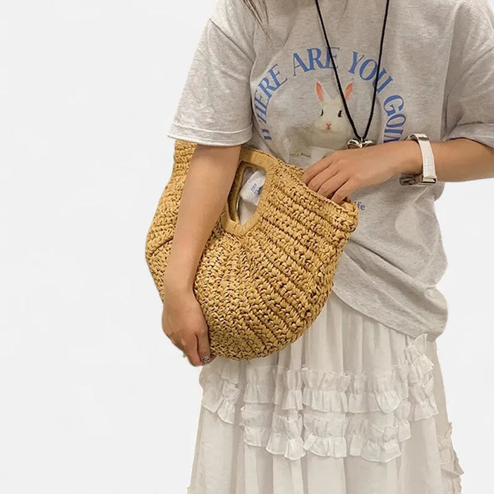 YSL Grand sac à main demi-lune en paille Naïa