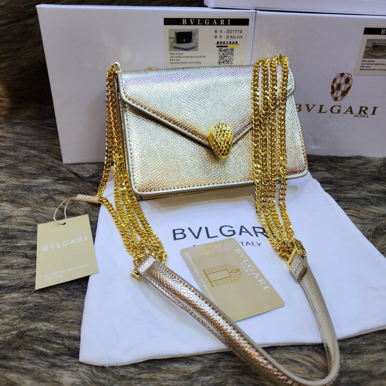 Bvlg@ri Sac bandoulière Serpenti exotique