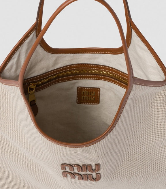 MIÛ MIÜ
Canvas Ivy Tote Bag