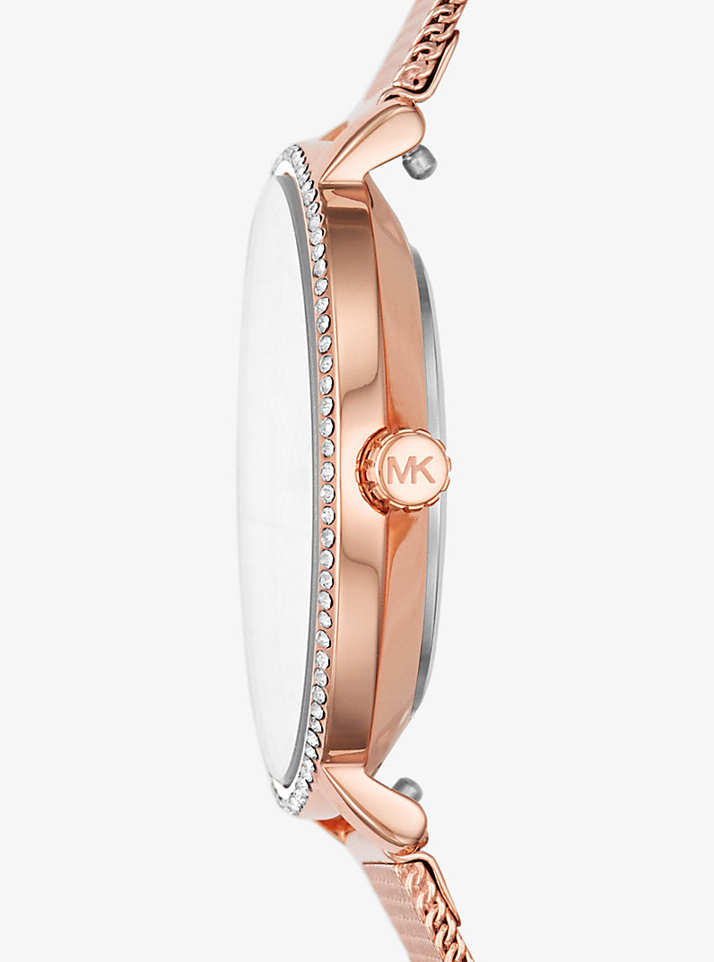Michael Kors
Mini montre Pyper ton or rose avec pierres pavées