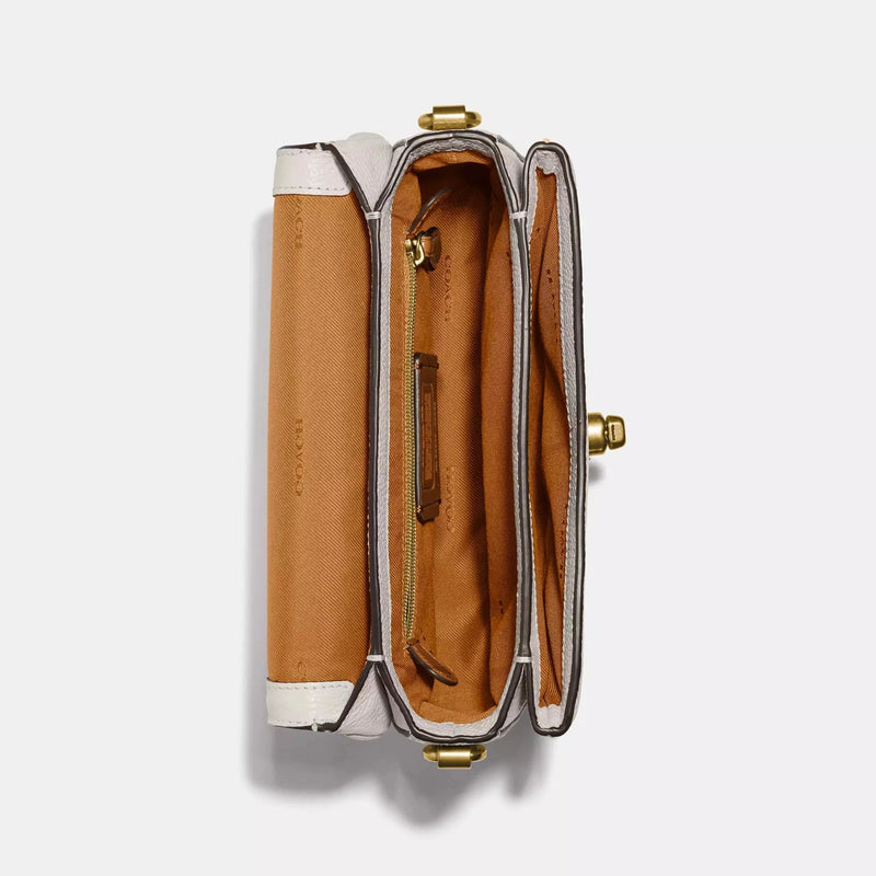 Sac bandoulière Co@ch Cassie 19 pouces couleur craie