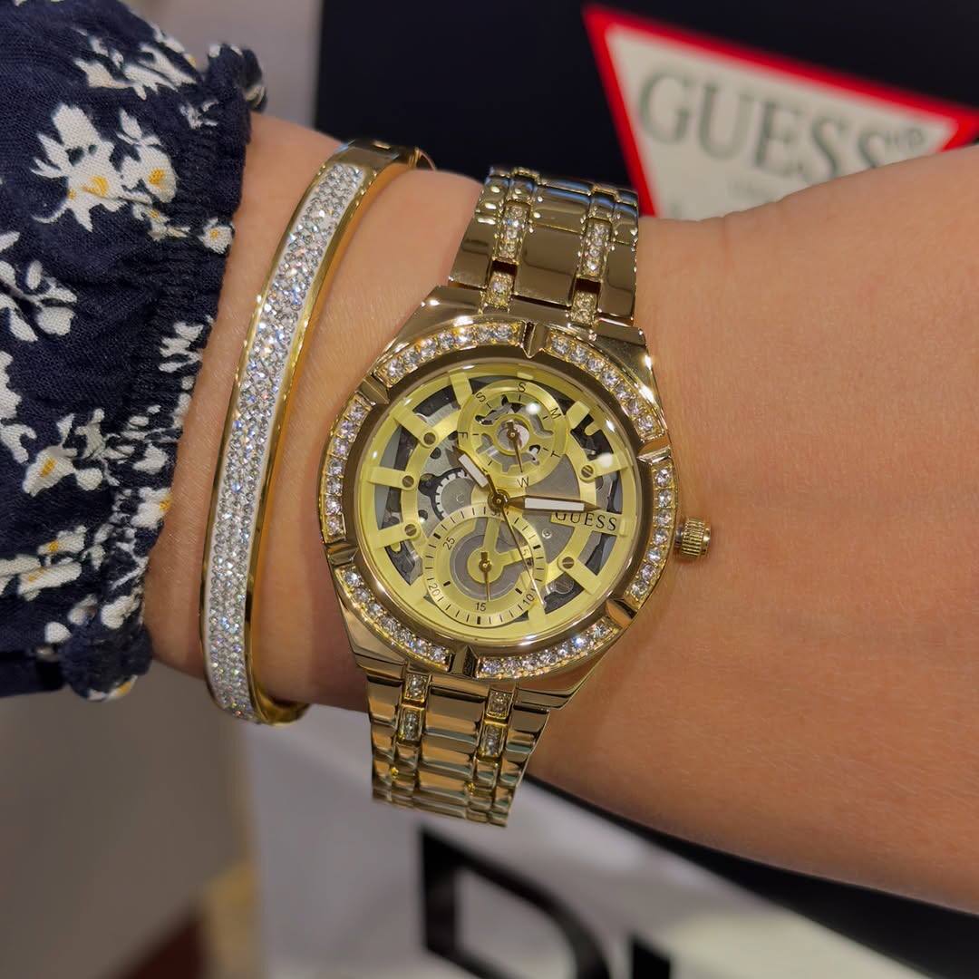 Guess Montre multifonctionnelle à découpe dorée