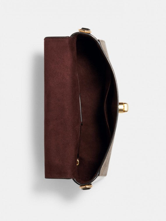 Sac à main Co@ch Marlie à poignée supérieure en toile à motif signature.