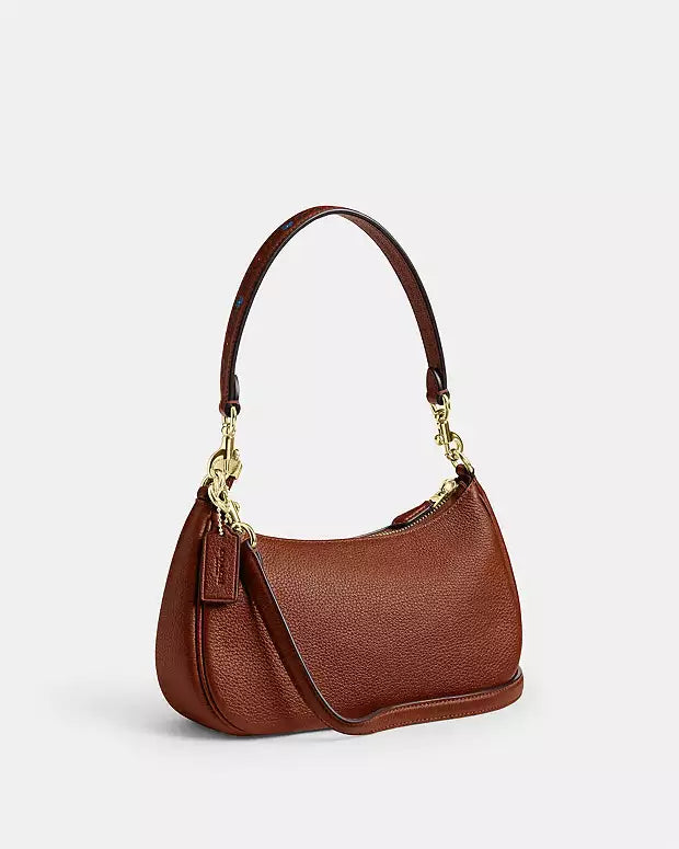 Co@ch Sac bandoulière Teri avec rivets