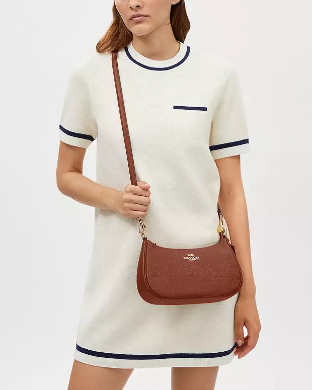 Co@ch Sac bandoulière Teri avec rivets