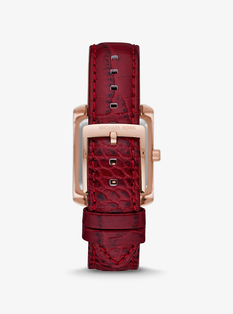 MK Montre Emery miniature de ton or rose à pavé et à bracelet en cuir gaufré à motif crocodile
