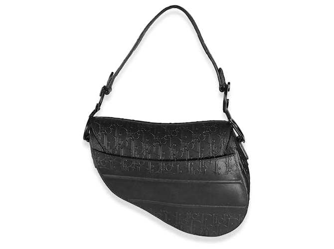 Christian Di*r Sac à dos moyen de veau noir oblique embossé