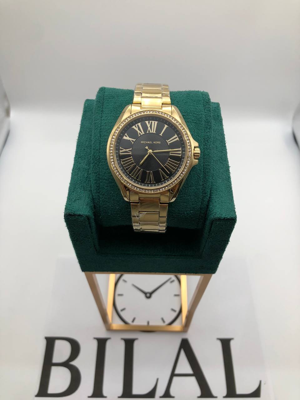 MK Montre Kaycie dorée à pierres pavées