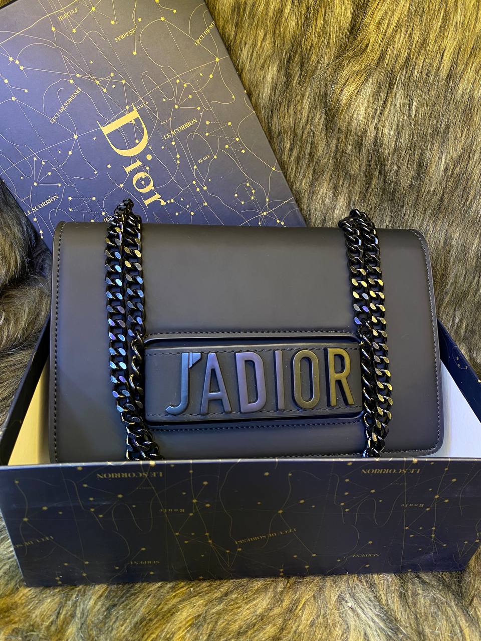 Christian Di*r
Sac bandoulière Di*r J'Adior noir mat