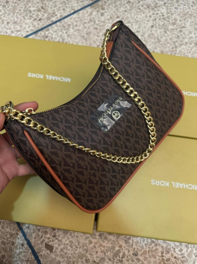 Mich@el Kors
Petite pochette Jet Set Charm à logo