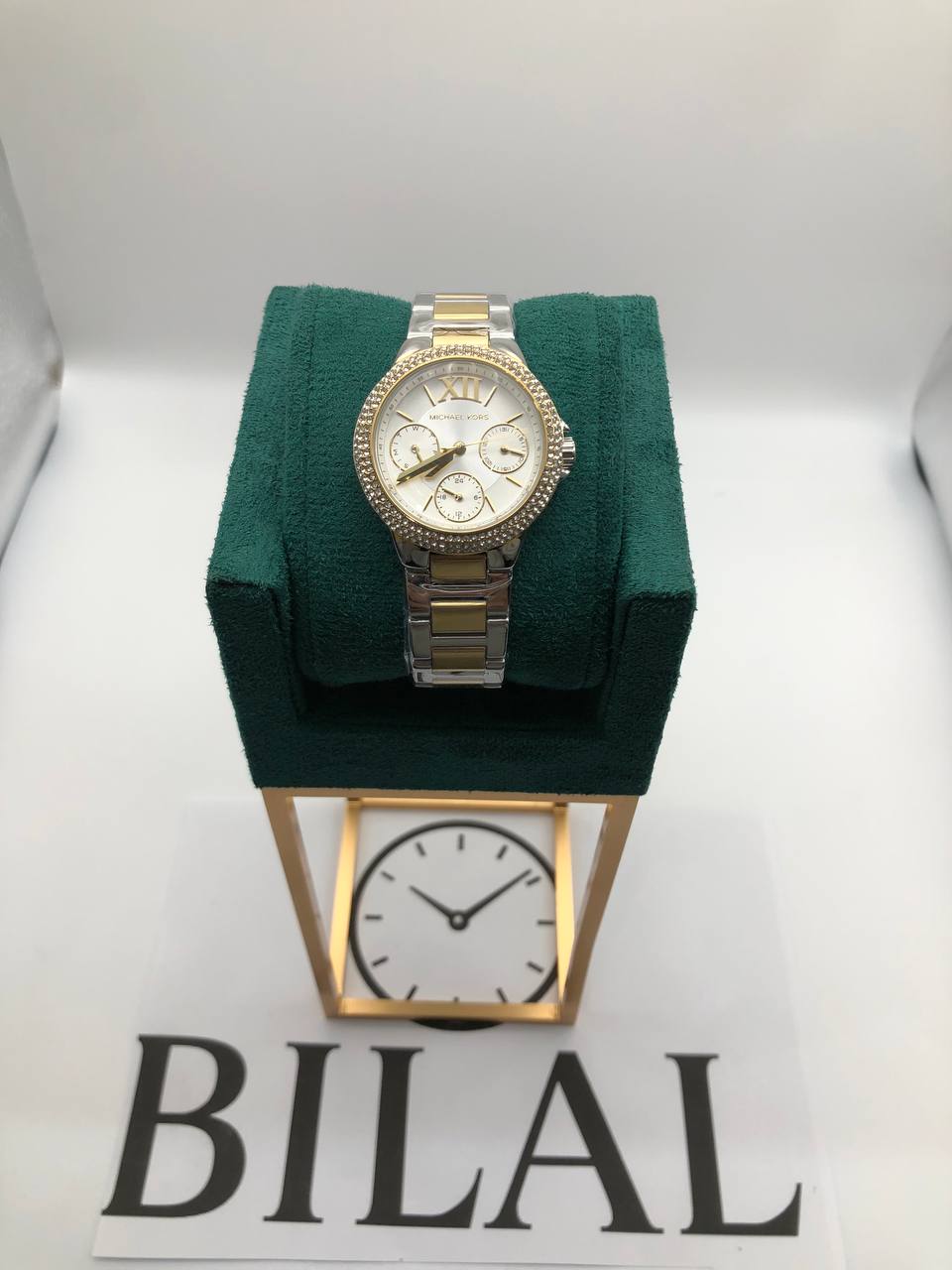 Mich@el Kors
Petite montre Camille bicolore avec pierres pavées
