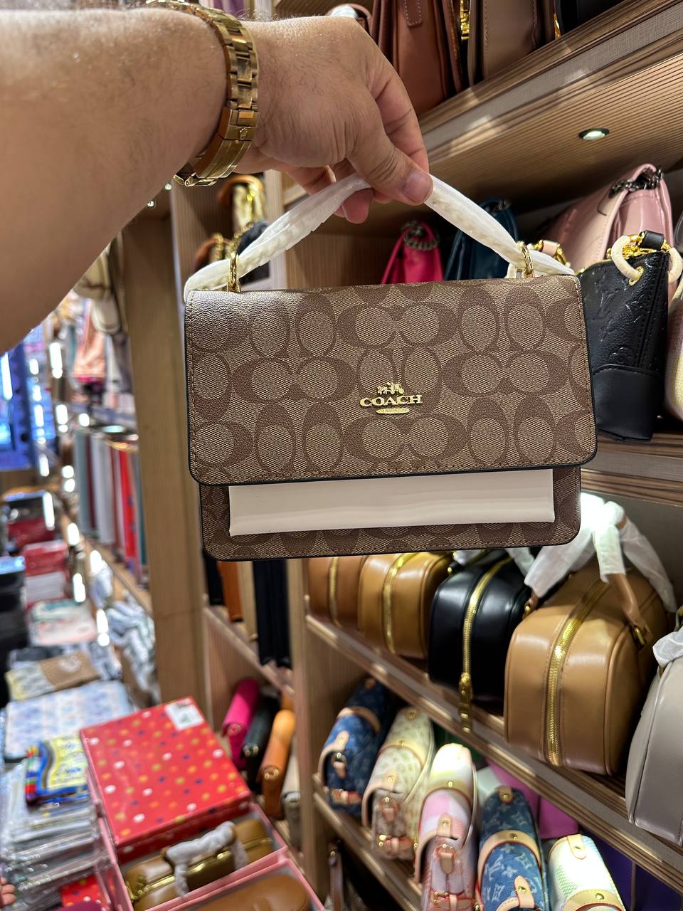 Co@ch Mini sac à porté-croisé Klare en toile signature