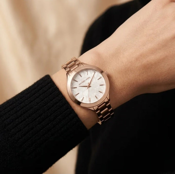 Michael Kors Outlet
Montre Aspyn de ton or rose