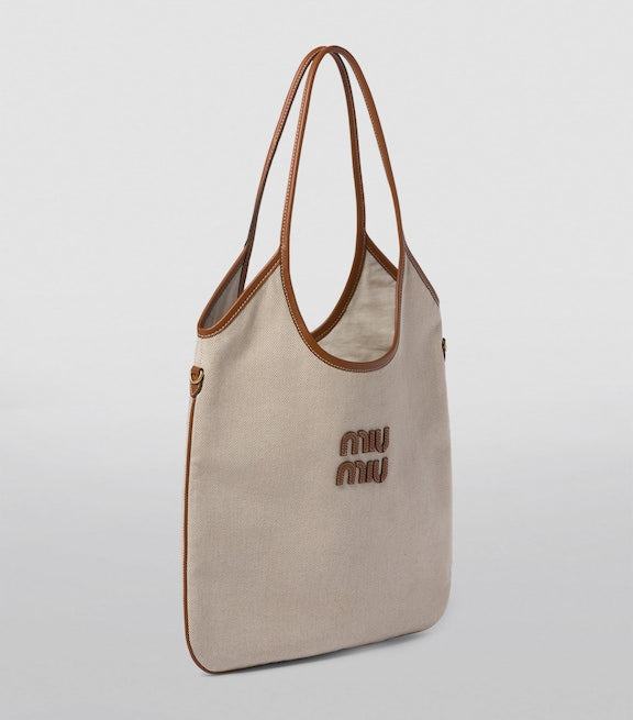 MIÛ MIÜ
Canvas Ivy Tote Bag