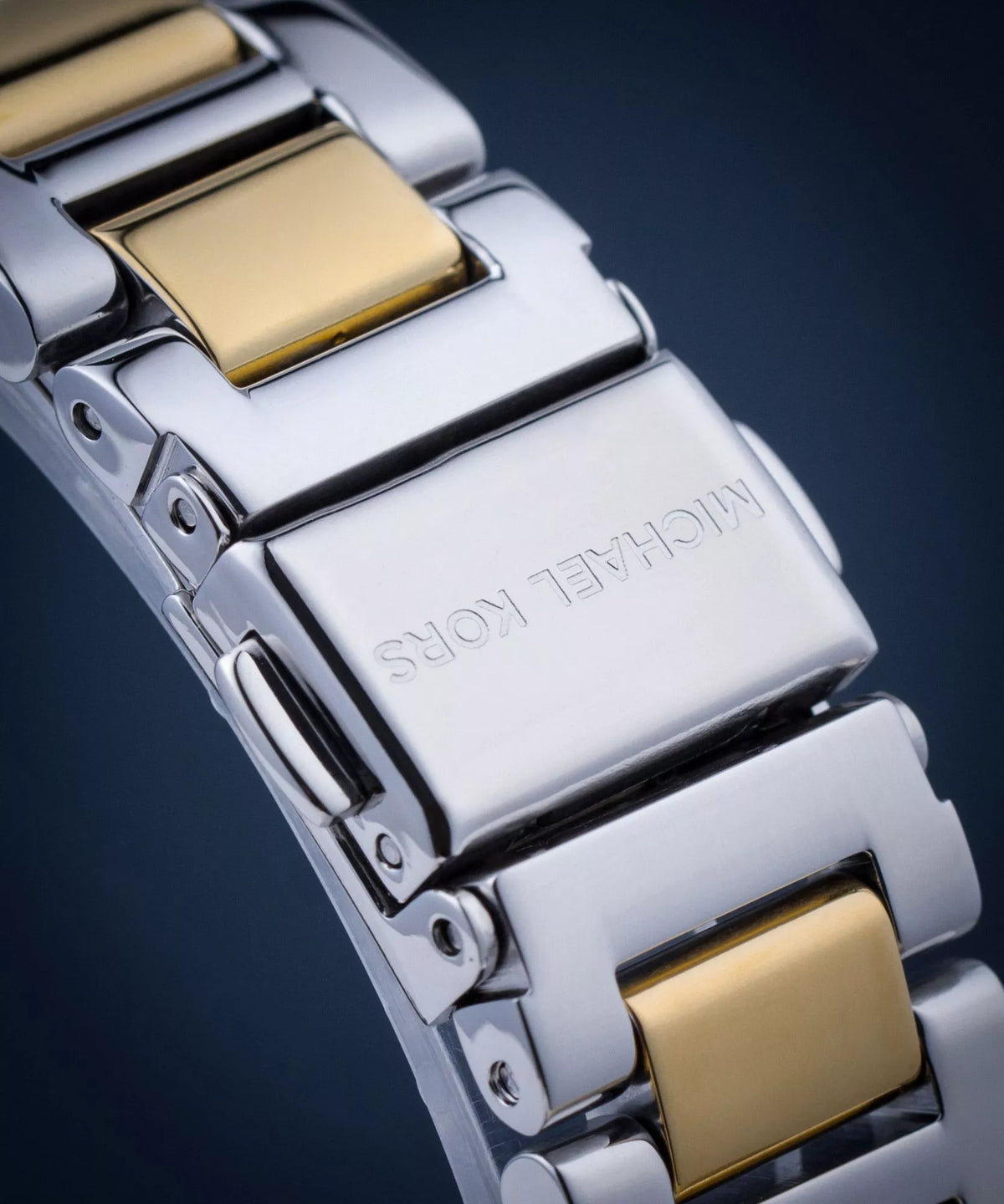 Michael Kors
Petite montre Camille bicolore avec pierres pavées