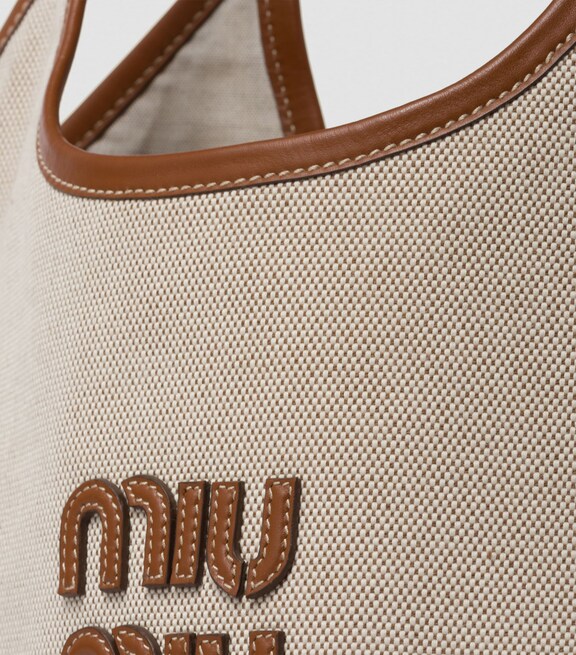 MIÛ MIÜ
Canvas Ivy Tote Bag