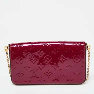 LV
Pochette 
Très bon état
Rose,