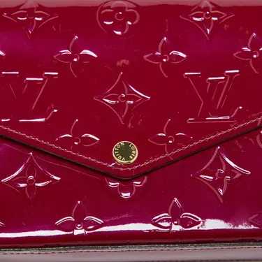 LV
Pochette 
Très bon état
Rose,