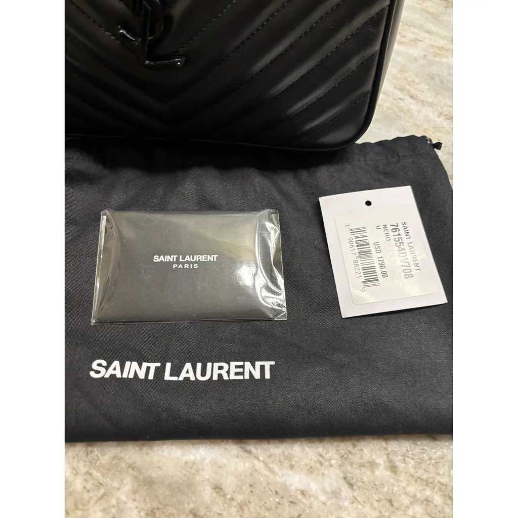 YSL Sac bandoulière Camera Lou, Très bon état 
Noir