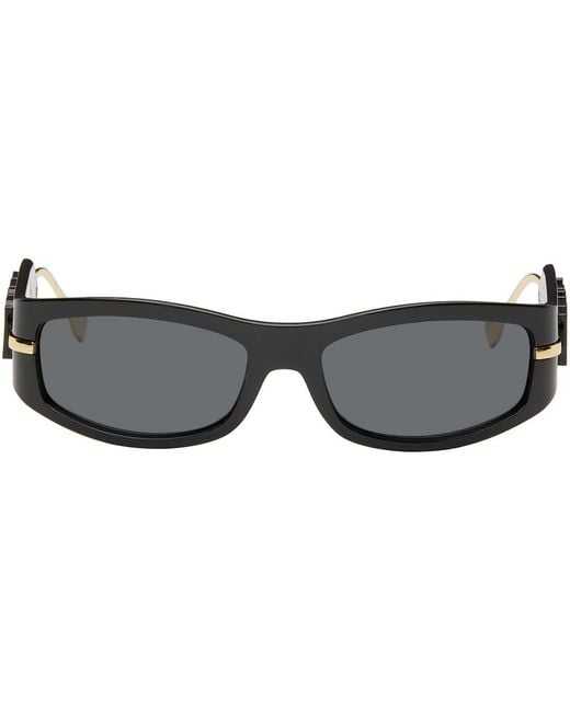 Fendi Lunettes de soleil noir et doré à logos graphy femmes