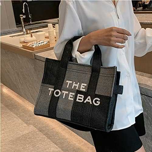 M@rc Jacôbs 
THE TOTE