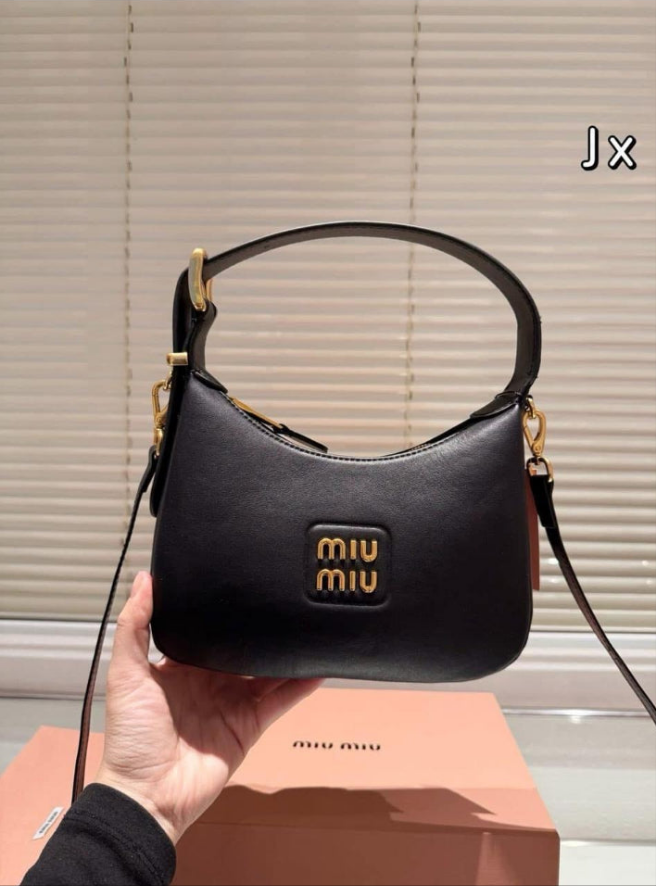 MIÛ MIÜ Sac bandoulière souple