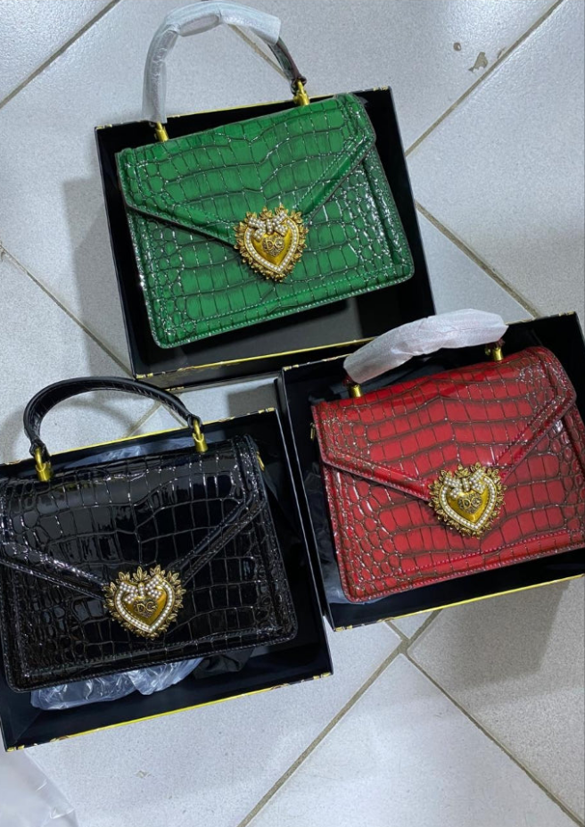 Dôlce & Gäbbãnå
Sac à main en alligator Devotion
Vert, Alligator