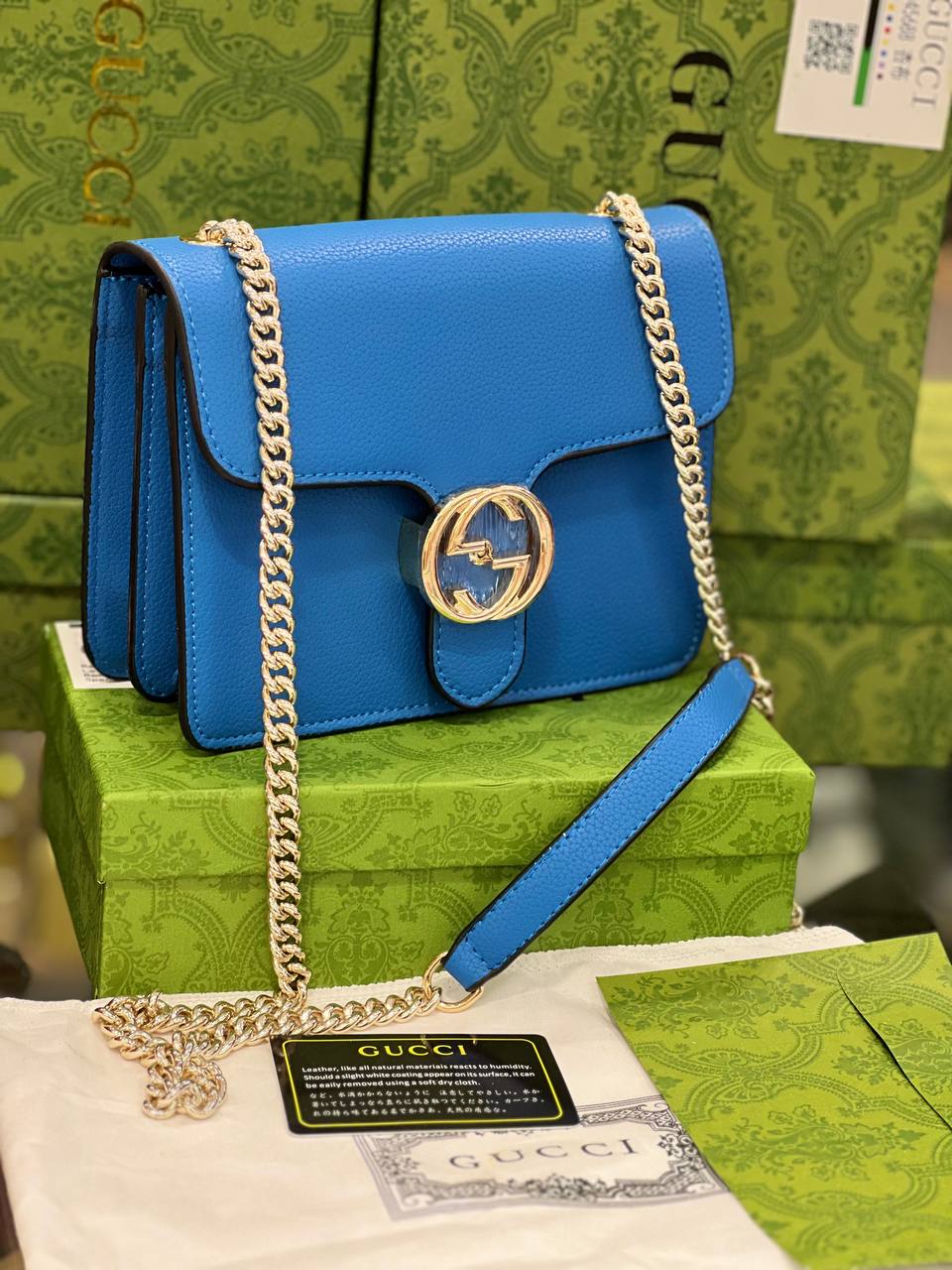 GG dollar veau bleu chaîne verrouillable sac à main